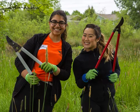 students participate in Day of Caring event