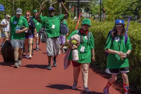 About 1,500 people came to OSU's Corvallis campus this summer for the Special Olympics Oregon. Here a team walks past the intramural fields where some of the softball competitions were held