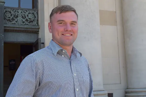 John Hilary in front of MU
